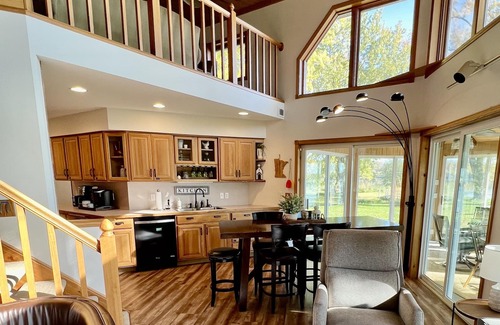 Cokato Cabin | A Creek Runs Through It & Garage Great Room