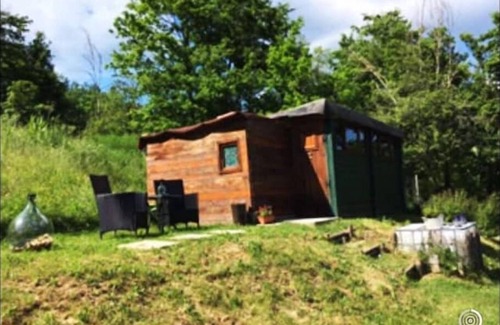 Villa Minozzo Cabin | A cute colourful Glamping cabin with a bohemian theme.