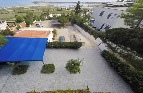 Porto Palo Apartment | A few steps from the beach of Porto Palo, apartment in a villa with sea view