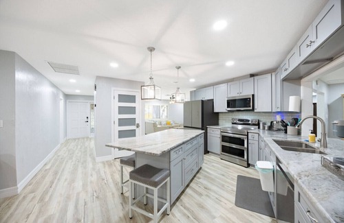 Fort Myers Shores House | A Forest Pool Calloosahatchee River Retreat