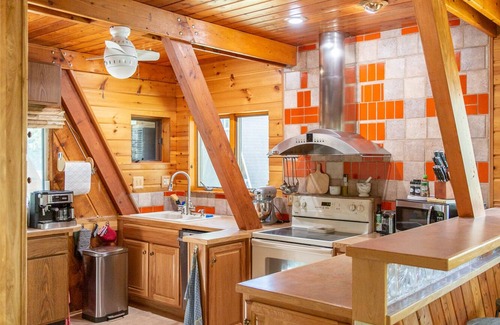 Thompsonville Cabin | A-Frame Cabin on Betsie River – Private Dock & Fishing Near Crystal Mountain