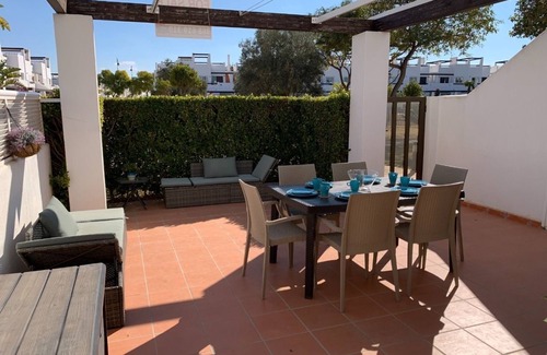 Alhama de Murcia Apartment | A fresh modern apartment on a lovely garden with a shared pool