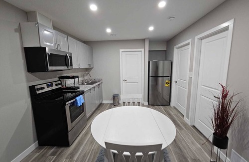 Regina House | A Fully furnished basement suite with separate entrance.