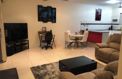 Marrara Apartment | A game of Golf, stroll home & relax with a glass of wine & a refreshing swim