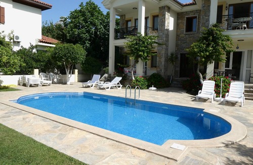Dalyan City Center Apartment | A Ground Floor Apartment With Shared Pool In Well Tended Grounds