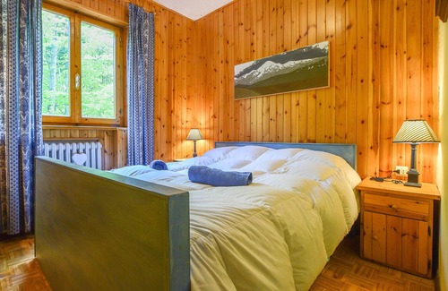 Abetone Apartment | A lot of wood and a lot of nature.