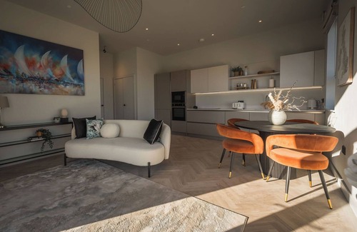 Amlwch Apartment | A luxury ground-floor apartment, offering stunning coastal views for up to 4 guests
