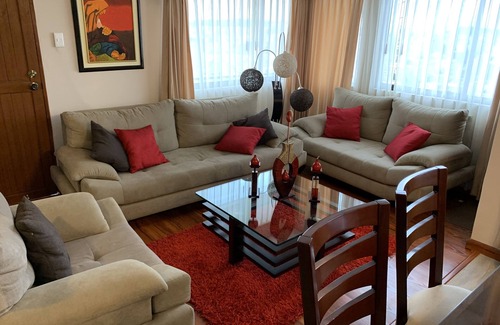 Quito House | A modernized home in the midst of a stable, family oriented neighborhood.