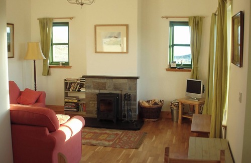Clachtoll Cottage | A pretty detached single storey cottage set in its own grounds.