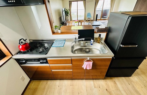 Yunokawa Onsen Apartment | A panoramic view of Lake ShinjiSpacious living s/Matsue Shimane