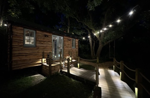 Warrington Cabin | A peaceful countryside retreat with a private hot tub and cozy log burner.