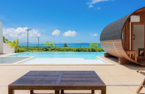 Miyakojima House | A private villa with a pool jacuzzi and sauna overlooking the ocean from a high vantage point/Miyakojima Okinawa