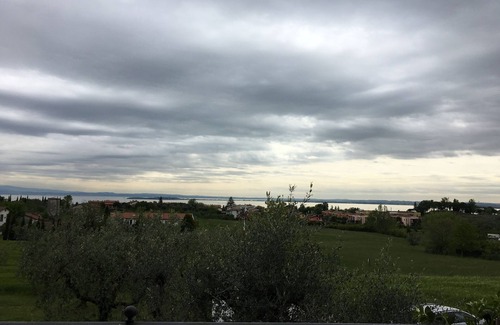 Padenghe sul Garda Apartment | A quiet terrace with a breathtaking view of Lake Garda