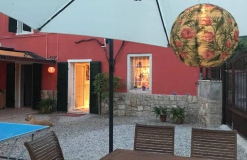 Caprino Veronese Apartment | A short distance from Lake Garda surrounded by greenery stands RedHouse