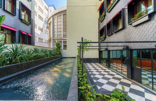 Centro / Baixa Hotel | A short drive away from Ingleses Beach! Comfortable City View Unit! Pool Access!