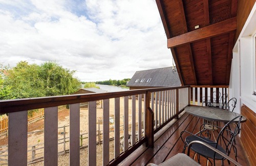 Pentney Cottage | A stunning four bed lodge with four full en-suite bathrooms with lake views.