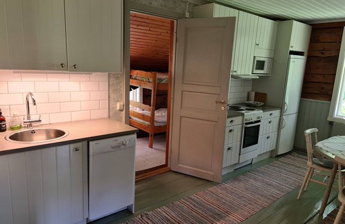 Svenljunga Municipality Cottage | A typical swedish timber house- red with white corners