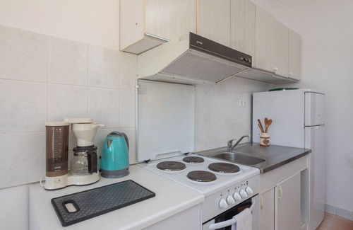 Stobrec Apartment | A2 - apt near beach with patio, parking and grill