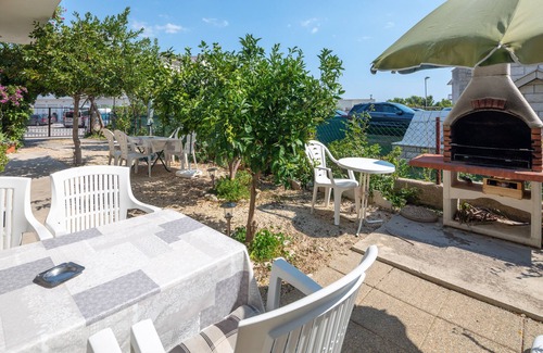 Stobrec Apartment | A2 - apt near beach with patio, parking and grill