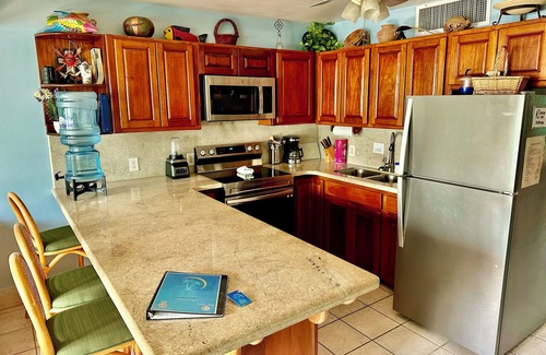 San Pedro Condo | A6 Fabulous view of the Barrier Reef plus pool, bikes, kayaks, & more!