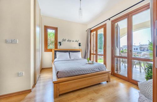 Aphrodite Hills Apartment | AA02 Adjacent to Aphrodite Hills- Communal Pool, Garden