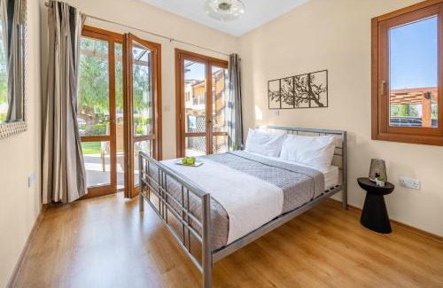 Aphrodite Hills Apartment | AA02 Adjacent to Aphrodite Hills- Communal Pool, Garden