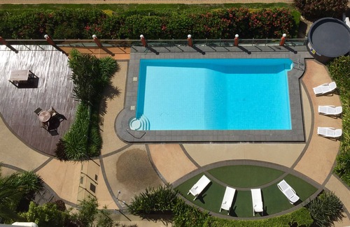 North Ward Apartment | Absolute seafront Strand studio Balcony Pool Free Parking WiFi self checkin