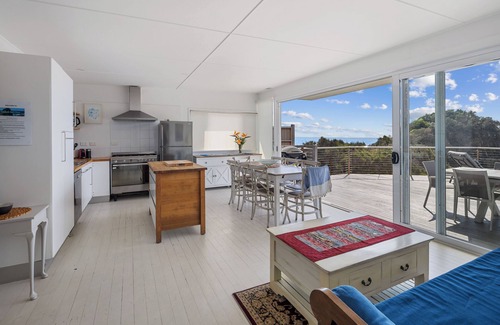 Scotts Head House | Absolute waterfront beach house with massive deck - family and dog friendly
