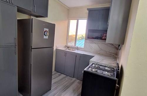Gros Islet House | Ackee Green Rental - 2 bedrooms/5 mins from Beach/Shopping Malls/Street Party