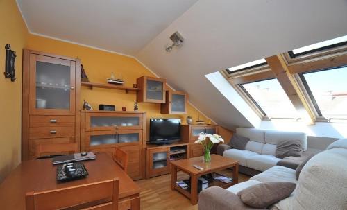 O Pindo Apartment | Acogedor ático a pie de mar y montaña.