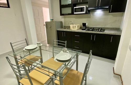 Banos de Agua Santa Apartment | Acogedora suite para parejas con jacuzzi en la habitación a 2 min del centro