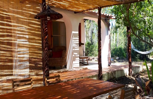 Muravera Villa | Across the river and through the trees. Relaxation and privacy within walking distance of the sea