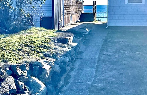 Rockport Cottage | Adorable Beach house with lots of outdoor space and steps to Long Beach!