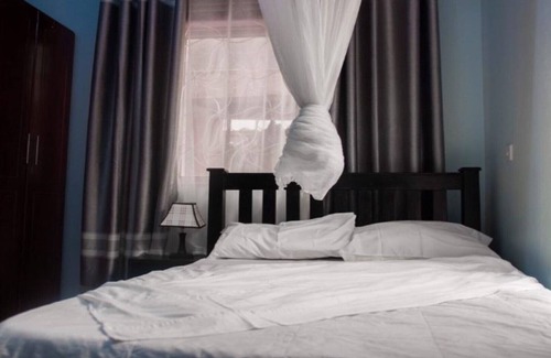 Namugongo House | Adrona apartment1 is located in naalya right opposite quality shopping mall.