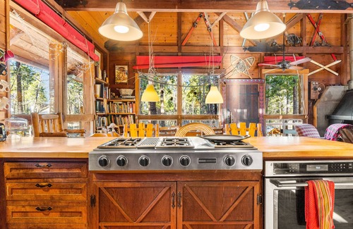 Groveland Cabin | Adventurer's retreat with a pizza oven, wood-burning fireplace, and large deck