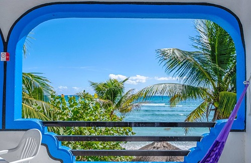 Akumal Condo | Affordable right on the beach! Beautiful colorful setting!