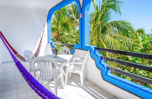 Akumal Condo | Affordable right on the beach! Beautiful colorful setting!
