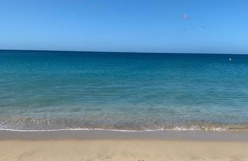 Borinquen Apartment | Aguadilla Waves Apt Free Parking & Wifi 8 minute walk from Crashboat beach
