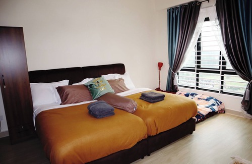 Cyberjaya Apartment | AIMIN HOMESTAYnCozy studio in peaceful Cyberjaya with WiFi, AC, fitness room