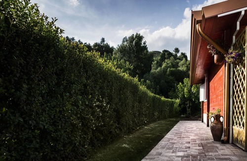 Nizza di Sicilia Ski Chalet | Air-conditioned chalets with a swimming pool, Wi-fi, TV, washing machine, family and animals