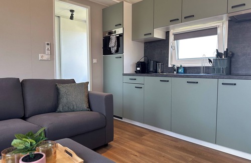 Municipality of Stichtse Vecht Boat Rental | Air-conditioned chalet with waterside terrace