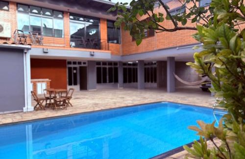Guarulhos City Centre House | Airport Stay Guarulhos – 600m Bosque Maia, Wi-Fi, Estacionamento, Sala de Espera, piscina, Check-in Facial