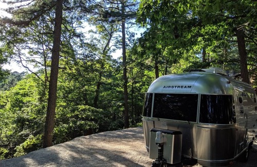 Eureka Springs RV Rental | Airstream with Hot Tub and Sunset Deck at Loblolly P