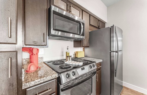 Windsor Park Apartment | Airy SoCo 2BR King Suite w/GymPickleballLaundry