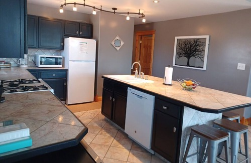 Monticello House | Alexander’s Landing Penthouse - Lakefront, Balcony, and Room to Relax