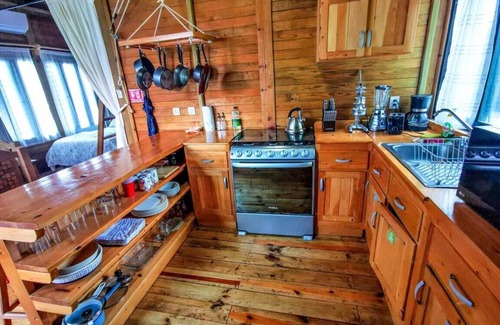 La Veleta Cabin | Alicat Villas: Unique spacious wood cabin, w/balcony overlooking pool Fast wifi