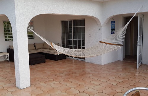 Maho Apartment | Aloha Penthouse apartment in the heart of the Maho entertainment area.