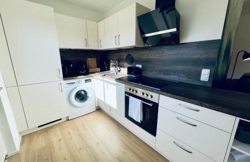 Bad Kohlgrub Apartment | Alpine Gemütlichkeit für 4 mit großer Sonnenterrasse