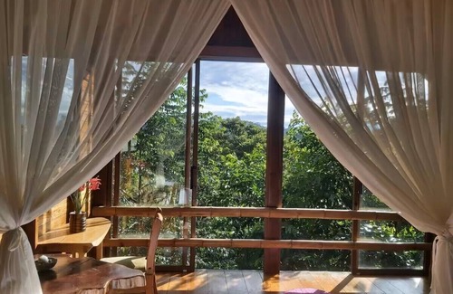 Banos de Agua Santa Cabin | Amanecer Amazonico - Rustic cabin with Amazon rainforest view