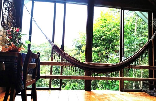 Banos de Agua Santa Cabin | Amanecer Amazonico - Rustic cabin with Amazon rainforest view